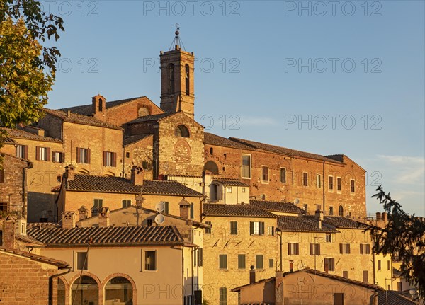 Chutch-tower of Convento di San Francesco and townhouses in early morning light