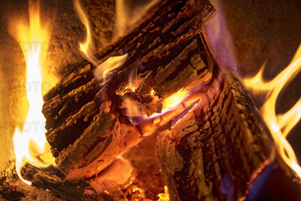 Burning log in the fireplace