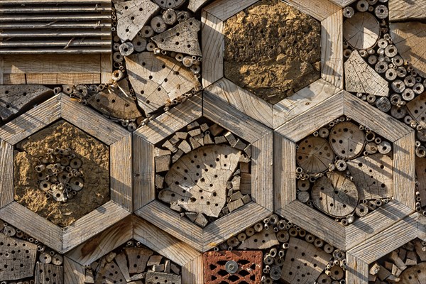 Insect hotel made of natural materials such as clay