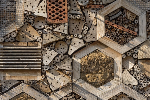 Insect hotel made of natural materials such as clay