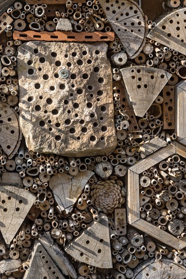 Insect hotel made of natural materials such as clay