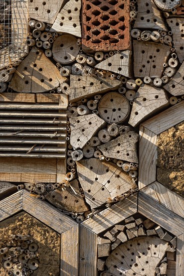 Insect hotel made of natural materials such as clay