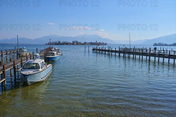 Lake Ciemsee wooden jetty and fishing boat