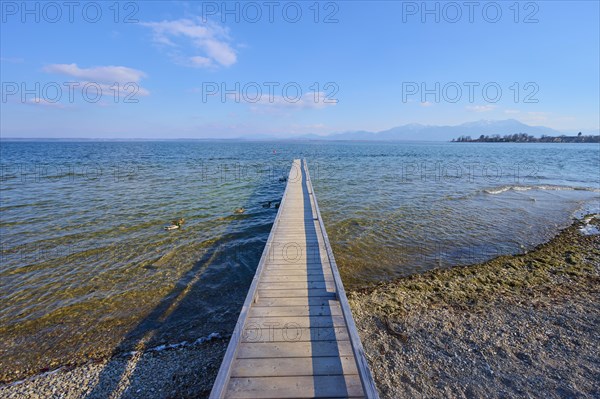 Lake Ciemsee with wooden jetty