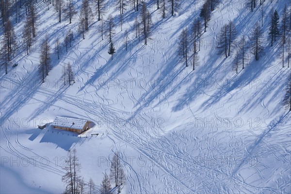 Alpine hut in winter