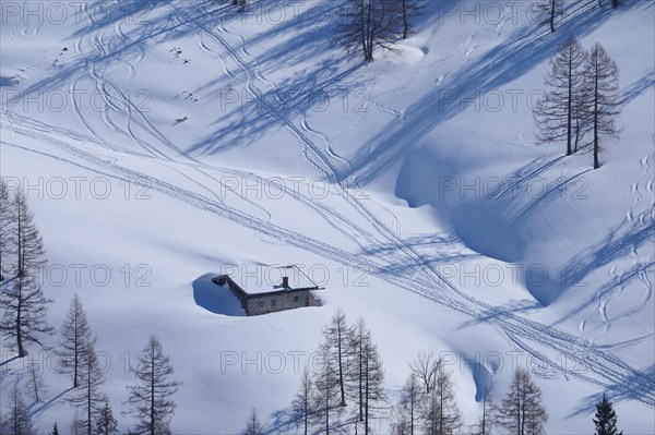 Alpine hut in winter