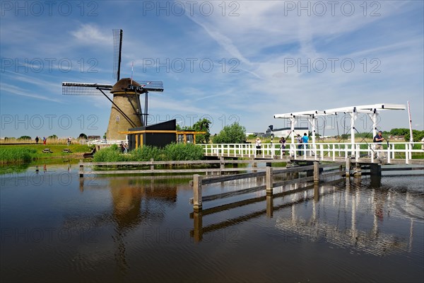 Old wooden windmill and bridge