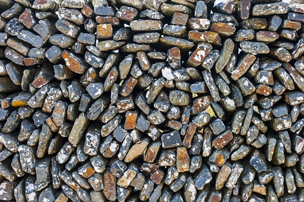 Stacked stones of oyster farm near Dolus