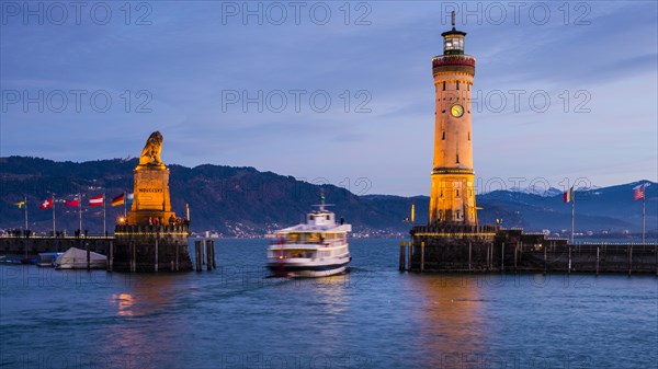 Harbour with lighthouse and Bavarian Lion