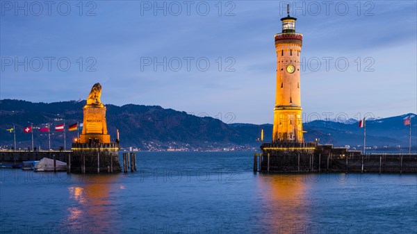 Harbour with lighthouse and Bavarian Lion