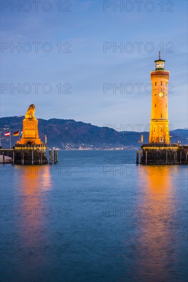 Harbour with lighthouse and Bavarian Lion
