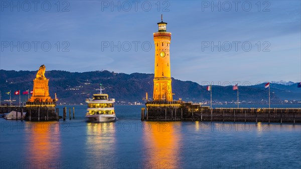 Harbour with lighthouse and Bavarian Lion