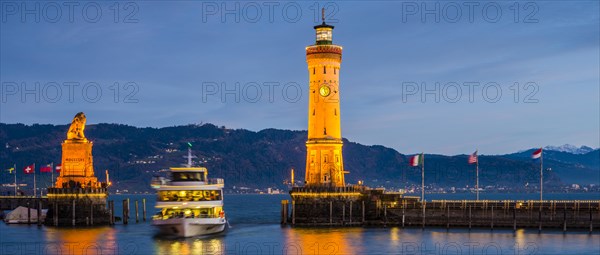 Harbour with lighthouse and Bavarian Lion