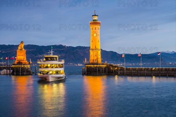 Harbour with lighthouse and Bavarian Lion