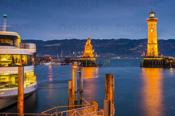 Harbour with lighthouse and Bavarian Lion