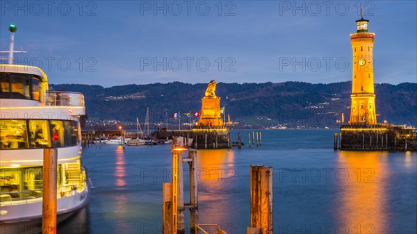 Harbour with lighthouse and Bavarian Lion