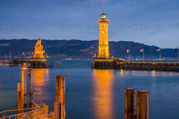 Harbour with lighthouse and Bavarian Lion