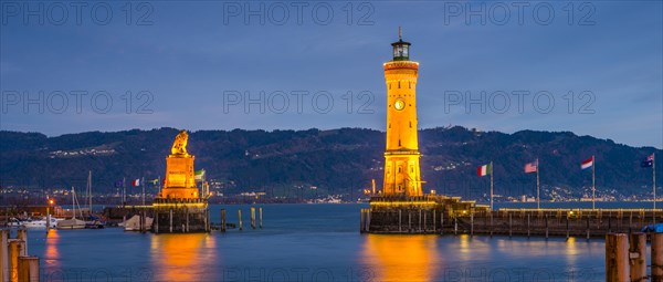 Harbour with lighthouse and Bavarian Lion