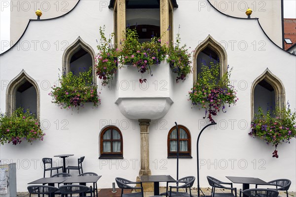 Flower decorations on the lancet windows at the town hall in Kempten