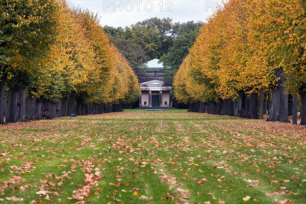 Autumn leaves in a meadow in front of the Guelph Mausoleum