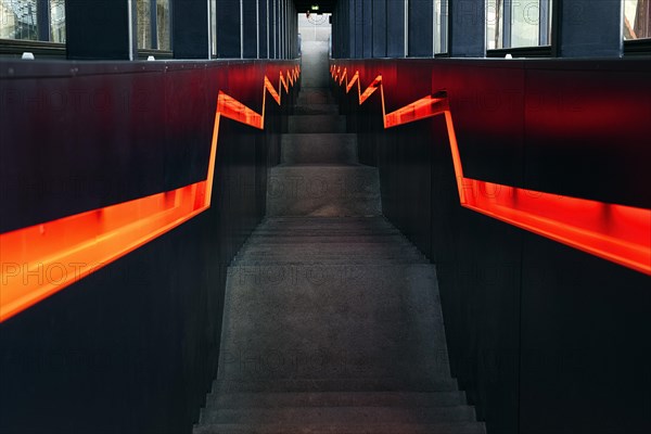 Dark illuminated staircase downwards