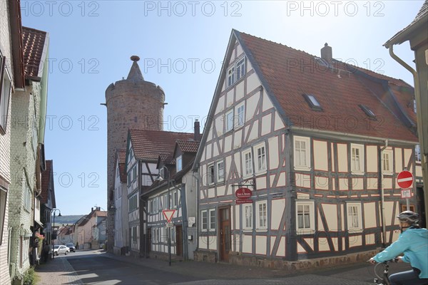 Historic Leonhard Tower built in 1386 and half-timbered house in Fuldauer Gasse