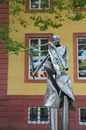 Modern sculpture as a metal flute player