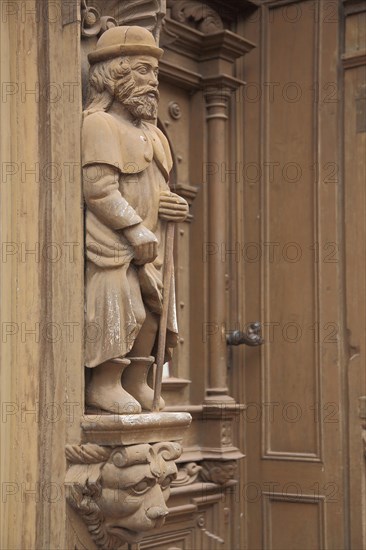 Wooden figure at Krummelsches Haus built 1875