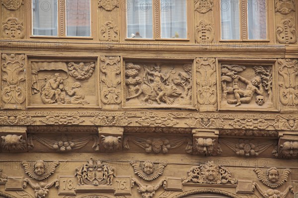 House wall with wood carving and ornaments with year at Krummelsches Haus built 1875