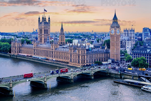 Westminster Bridge over the Thames with the Houses of Parliament at dusk