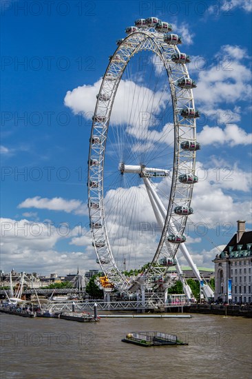 London Eye Ferris Wheel on the banks of the Thames