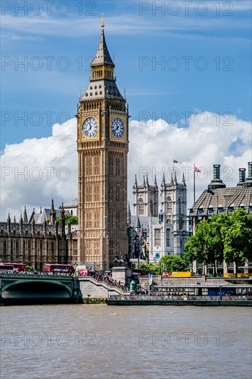 Clock Tower Big Ben on the Thames Embankment and Towers of Westminster Cathedral