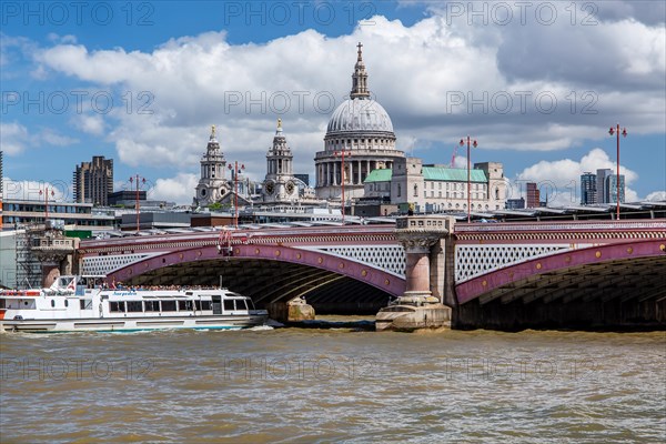Excursion boat on the Thames with Blackfriars Bridge and St. Paul's Cathedral
