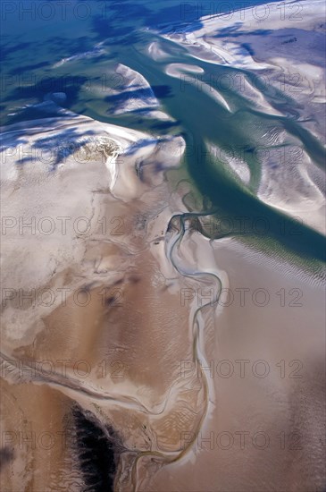 Aerial view of tideways and sandbanks in the North Sea in summer