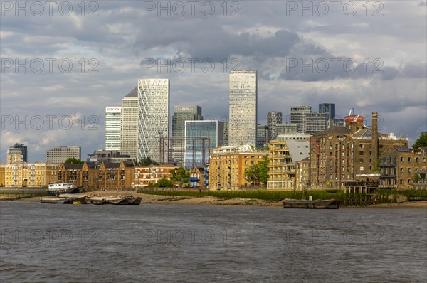 View from Rotherhithe of high rise office blocks at Canary Wharf