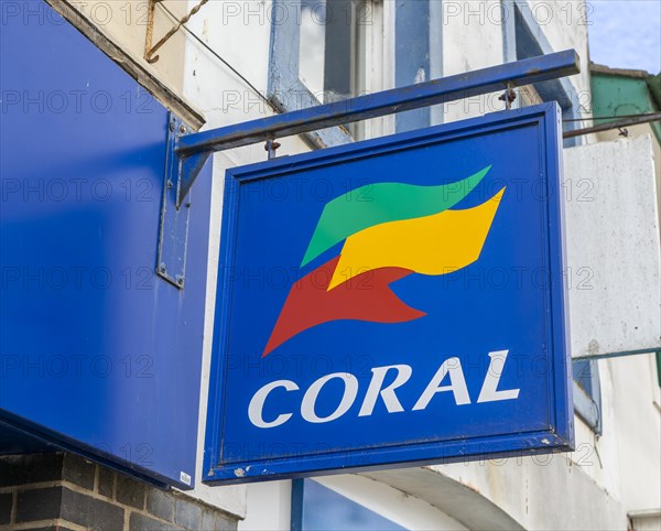 Coral bookmakers betting shop wall hanging sign outside bookies