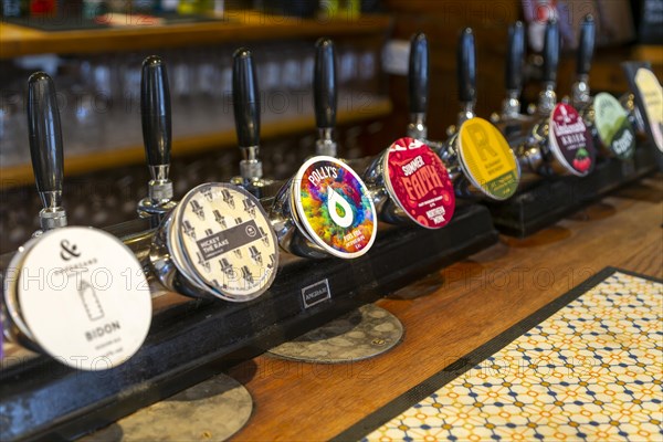 Line of keg beers on bar at Stanford Arms pub