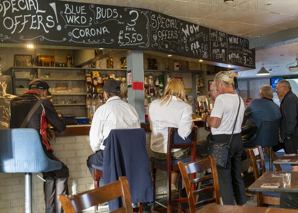 Customers inside The Welcome public house