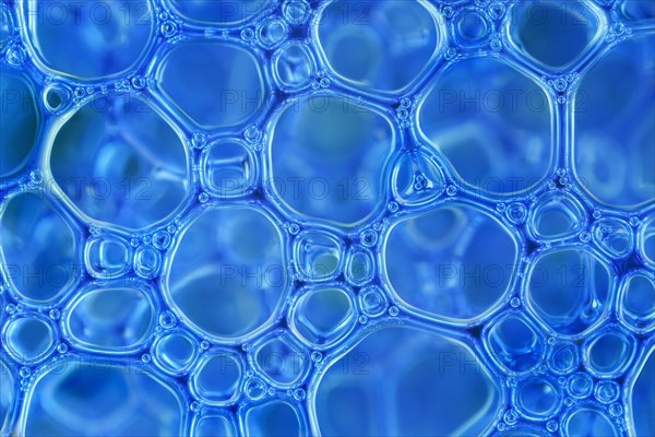 Blue foam bubbles in close-up