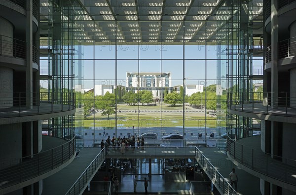 View from the atrium in the Paul Loebe House through glass facade onto the Federal Chancellery