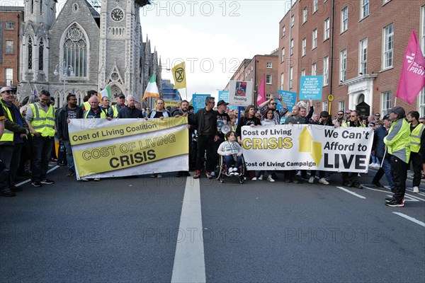 Participants in the Cost of Living Crisis protest march line up to lead the parade down through the city centre with banners on display. Dublin