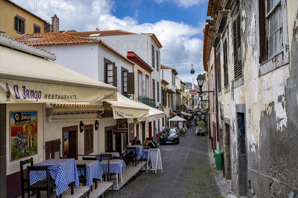 Alley with restaurants in the old town