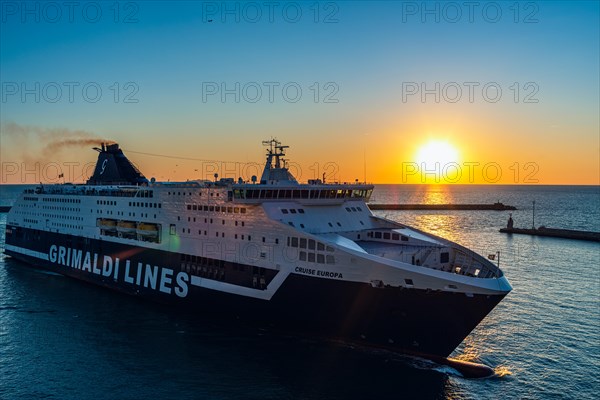 Grimaldi Lines Cruise Ship at sunset in Port of Livorno