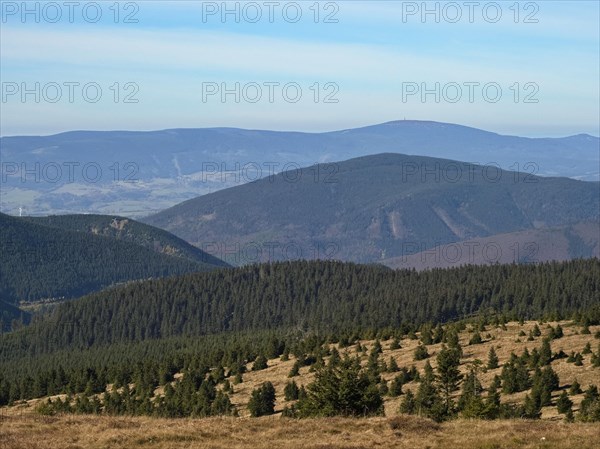 View from the High Heath in the Altvater Mountains of the landscape in the Altvater National Nature Reserve and the mountains of the Oelmuetz region in the west