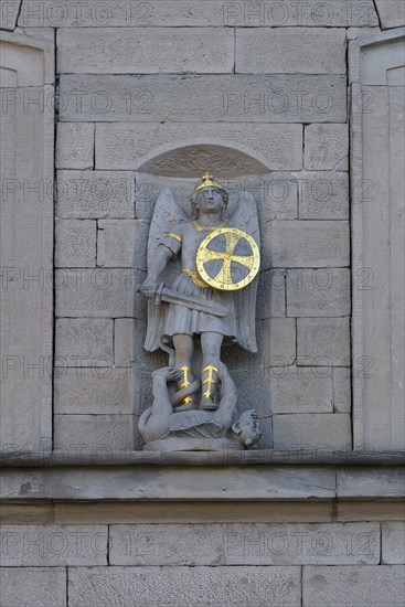 Sculpture of St. George with the dragon on a house facade around 1850