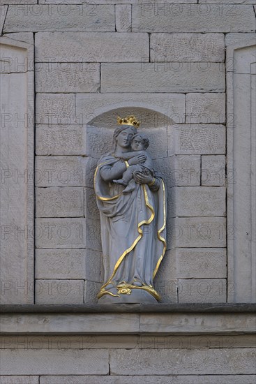 Sculpture of Maria Immaculata on a house facade around 1850