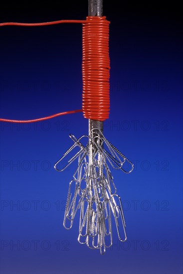 Electromagnet Holding Paperclips