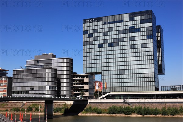 Ensemble of buildings and Hyatt Hotel along the Julo-Levin bank in the Media Harbour