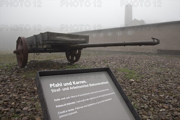 Cart with crematorium in the fog at beech forest concentration camp