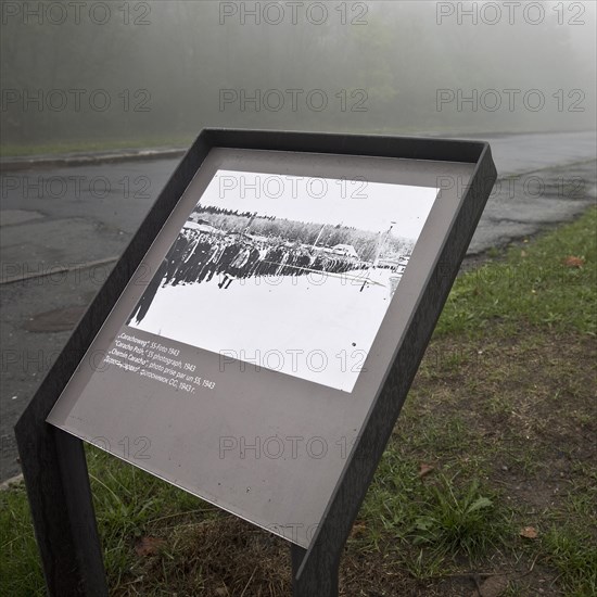 Old photo as a reminder of the Carachoweg in the fog at beech forest concentration camp